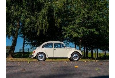 White 1974 VW Beetle side shot