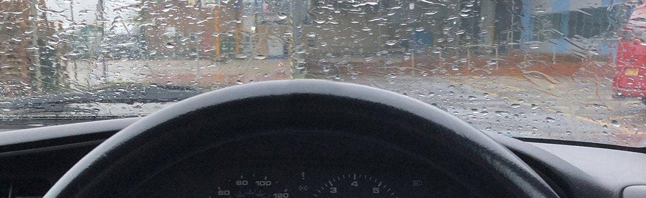 Inside VW Beetle with no carpet and tatty interior