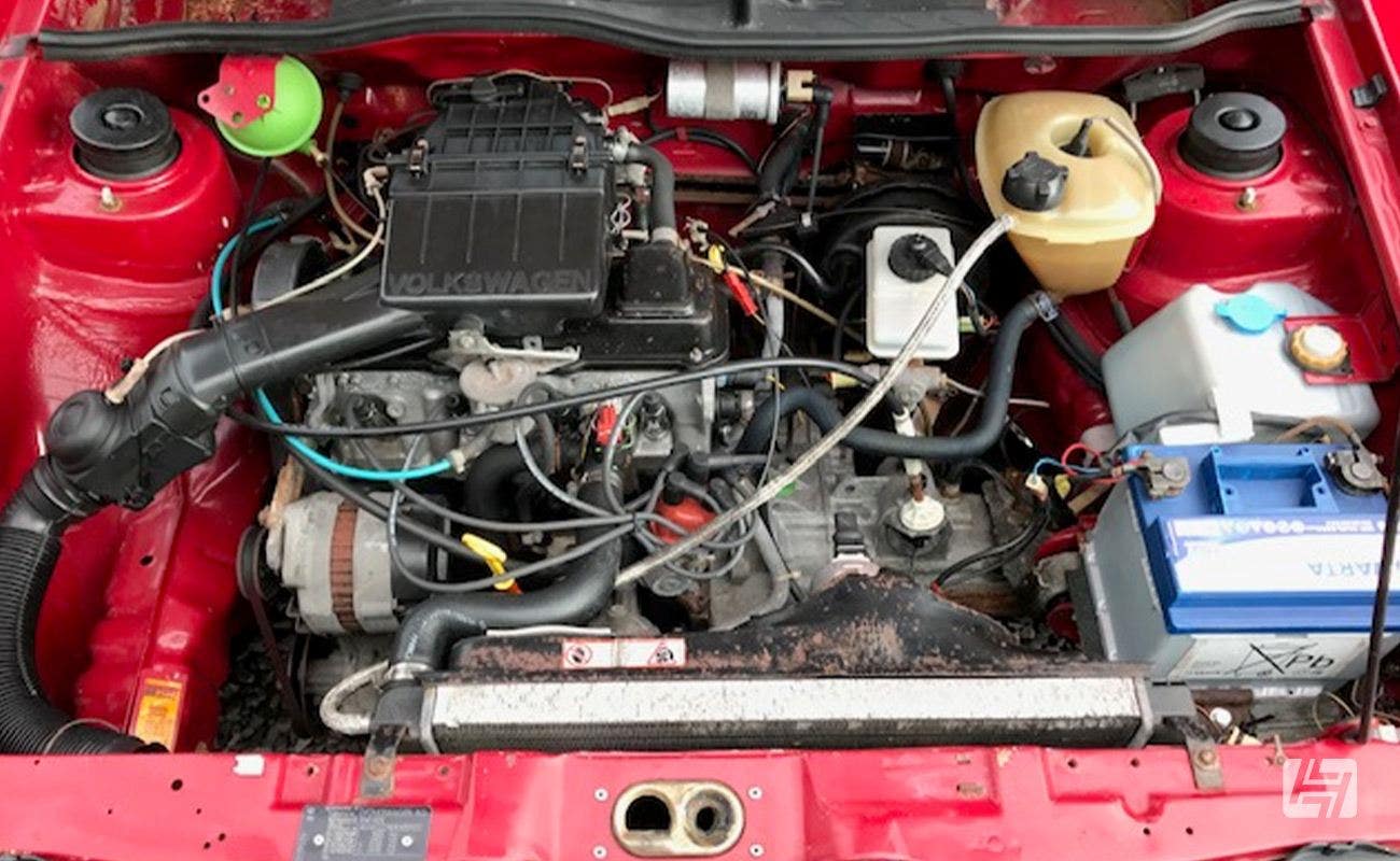 Original 1600/1800cc carburettor engine in red Volkswagen Caddy Mk1