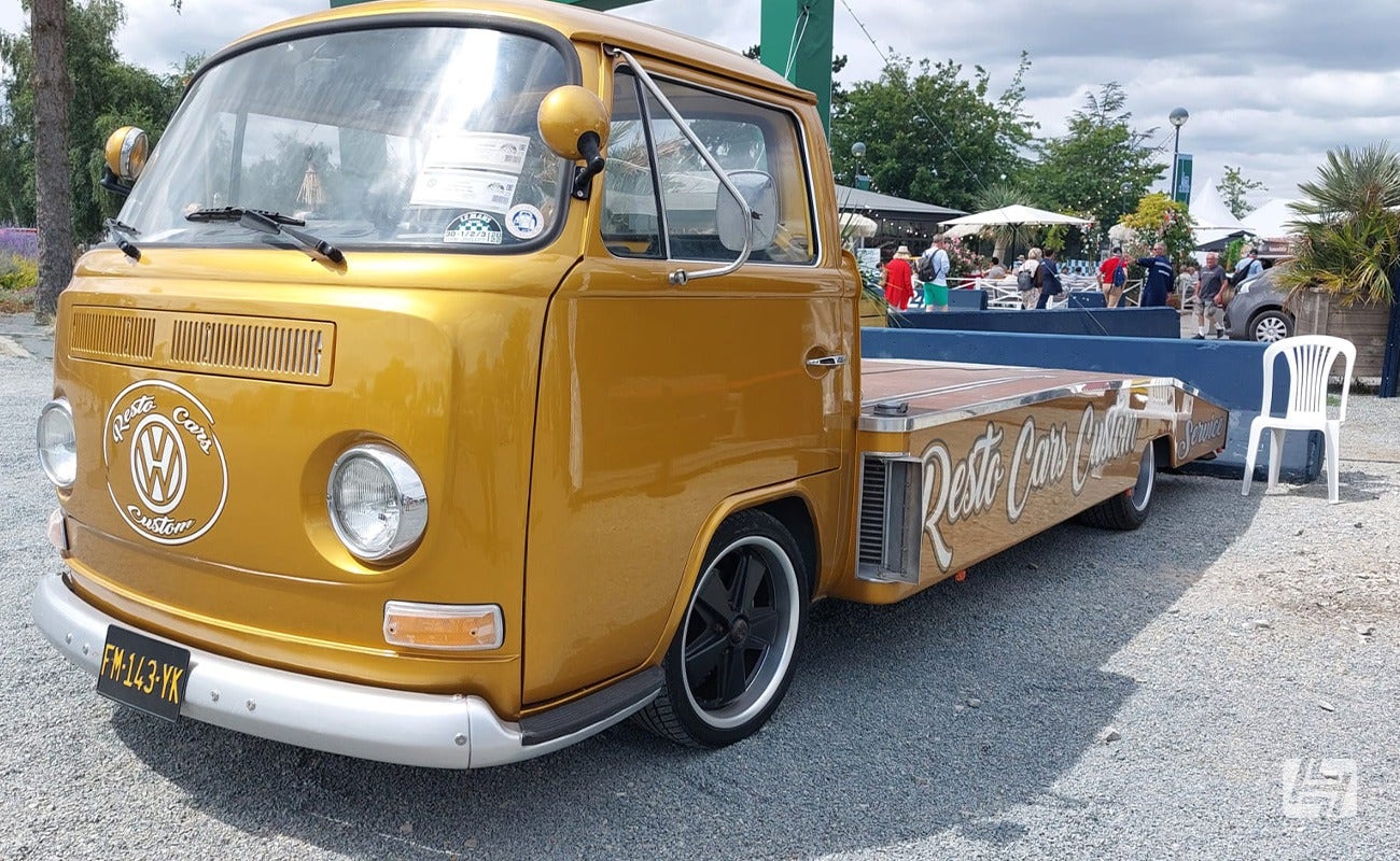 Gold VW Type 2 vehicle transporter at Le Mans Classic 2023