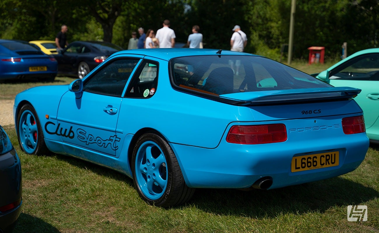 Rear side profile of blue Porsche 968 clubsport at Simply Porsche 2023