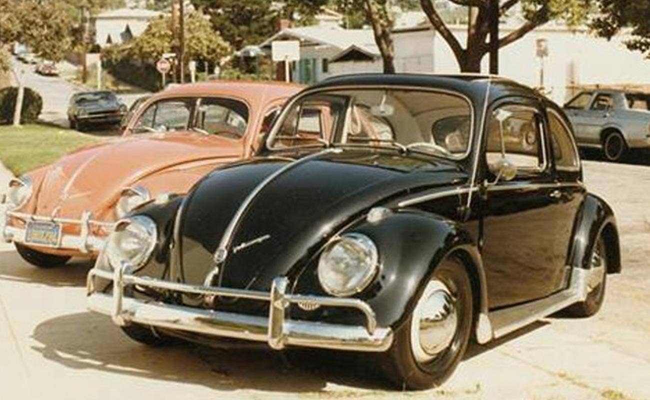 Cal-Style VW Beetles parked on driveway in early eighties