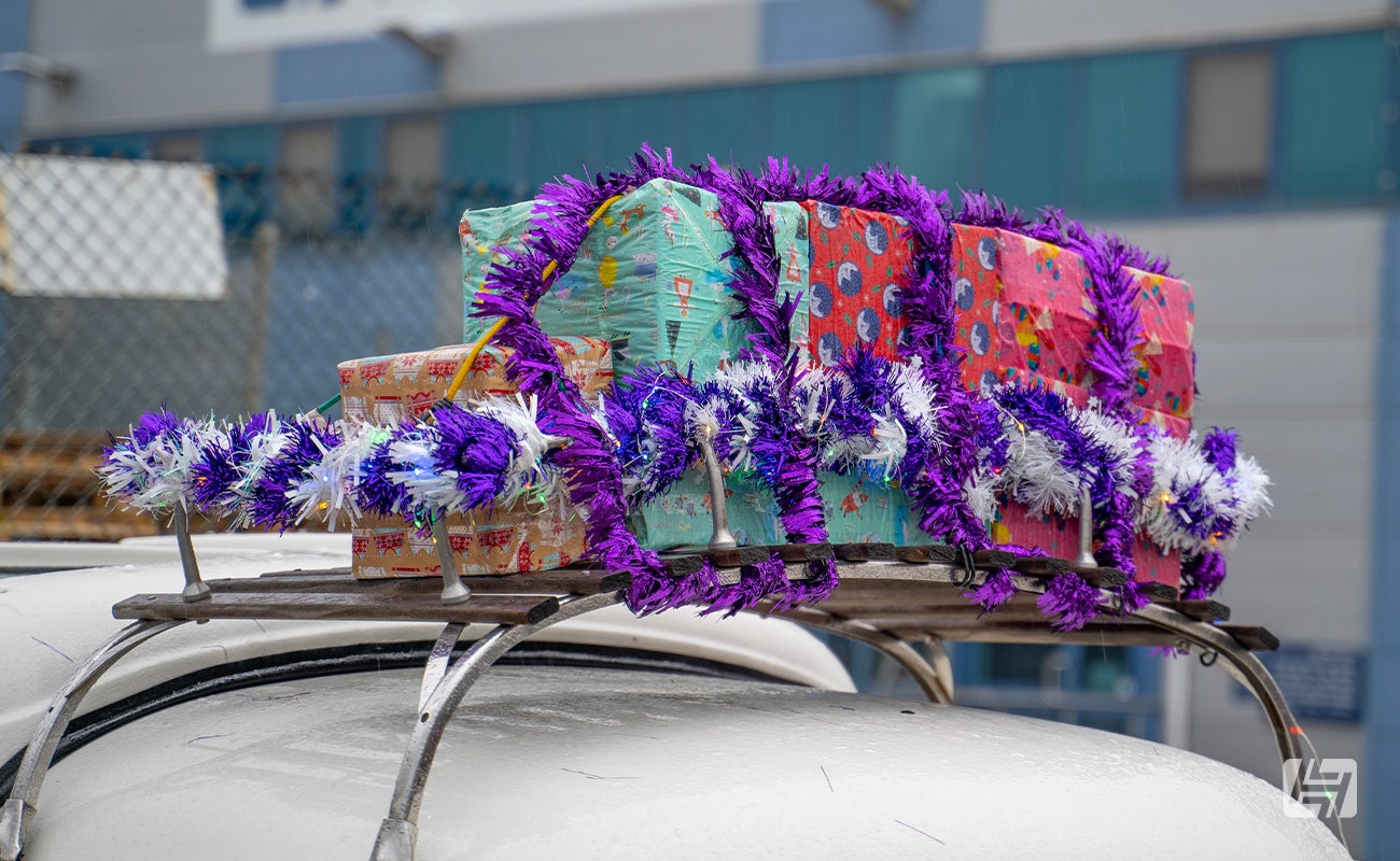 VW Type 2 roof rack with presents and tinsel 