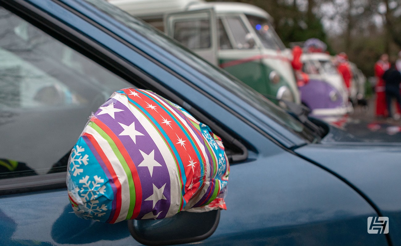 Porsche cup mirrors covered in Christmas wrapping paper