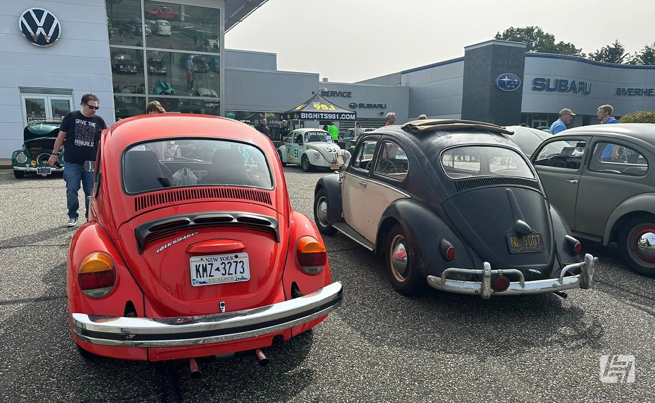 Long Island VW Club Show carpark with red and black VW Beetle