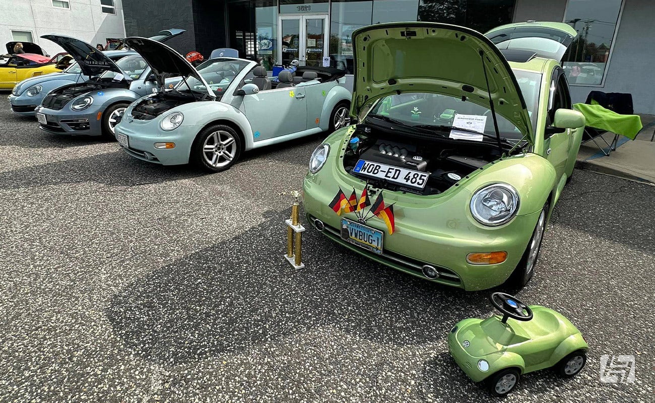 Long Island VW Club Show carpark with new Beetle line up