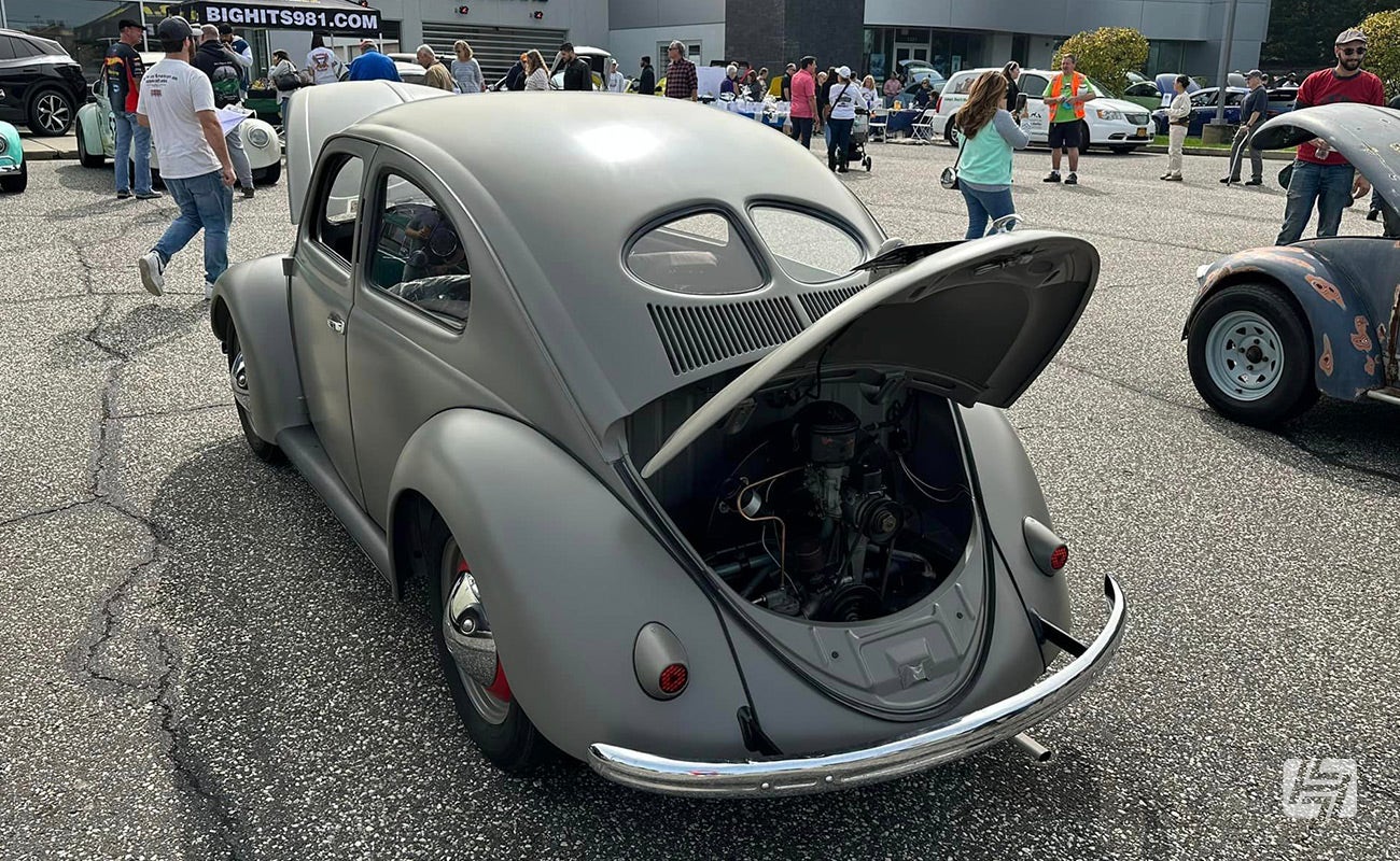 Long Island VW Club Show carpark with grey split window Beetle