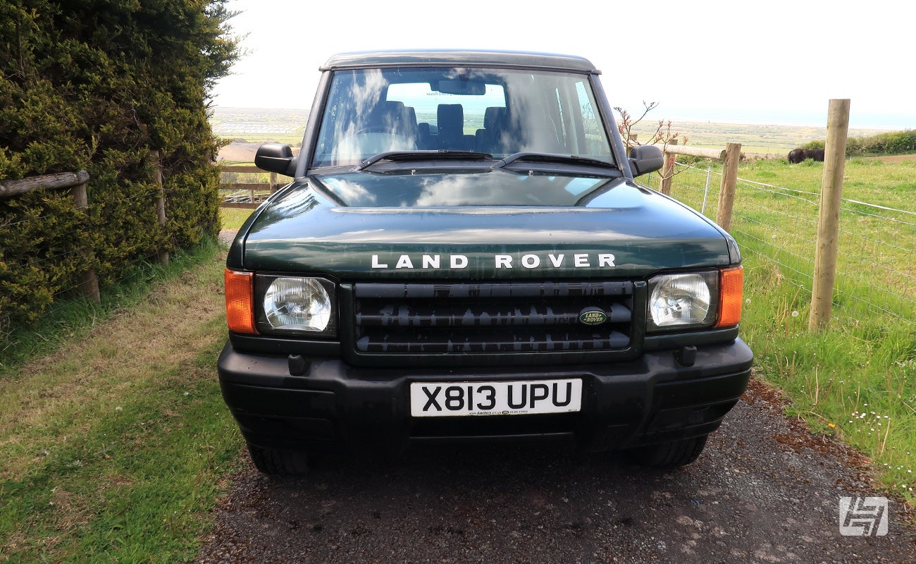 Green Land Rover Discovery 2 front shot