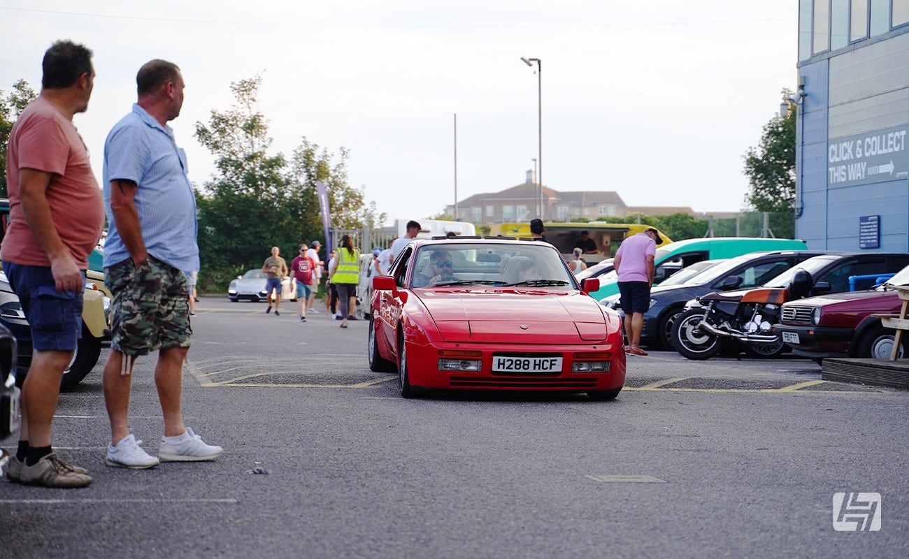 Heretics at Heritage Parts Centre September 2023. Red Porsche 944 driving