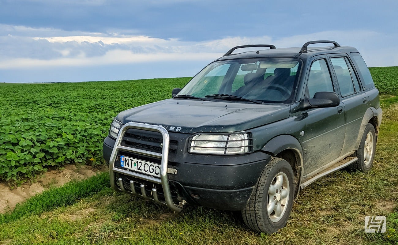 Land Rover Freelander parked in a field