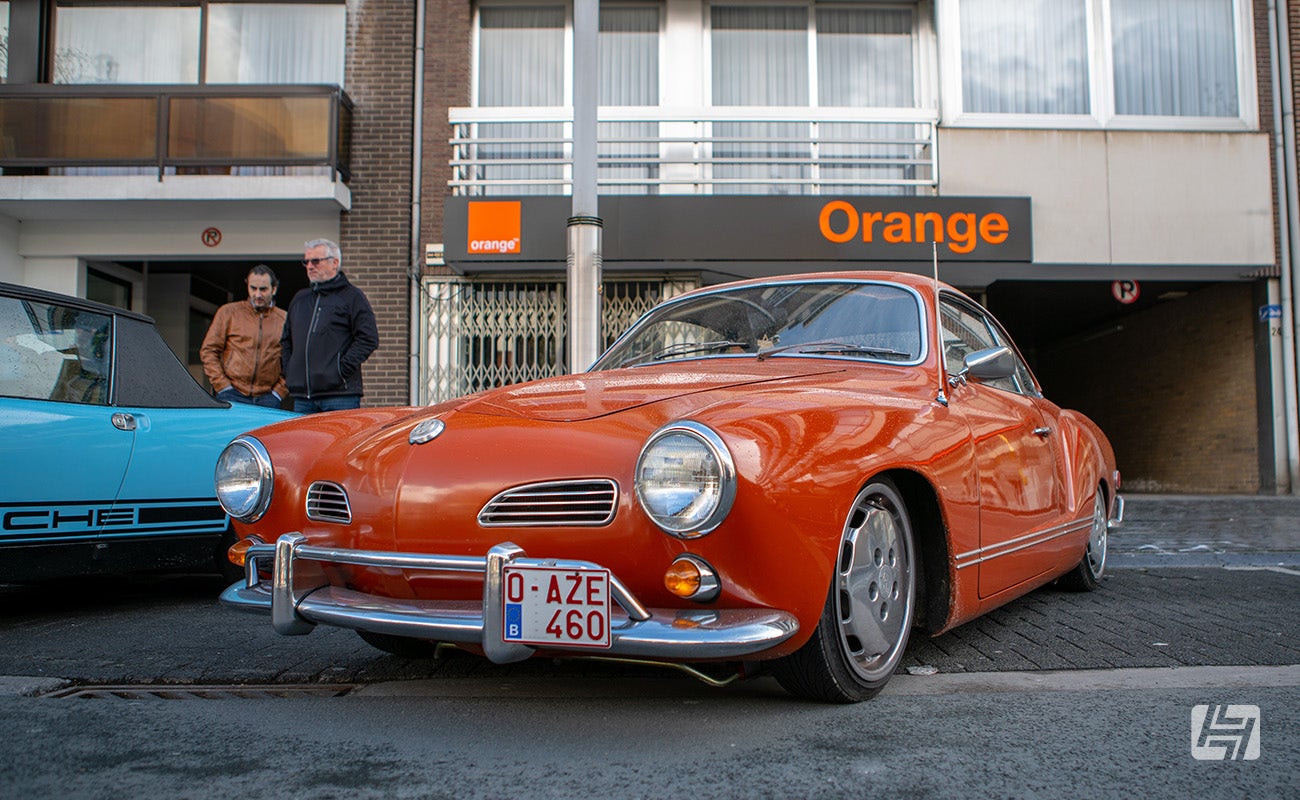 Orange Karmann Ghia parked outside the Orange mobile phone shop in Ninove