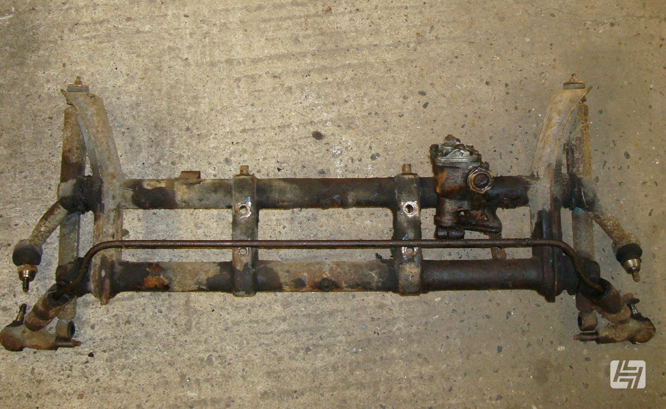 Well used VW Beetle front axle with ball joint fittings and anti-roll bar installed