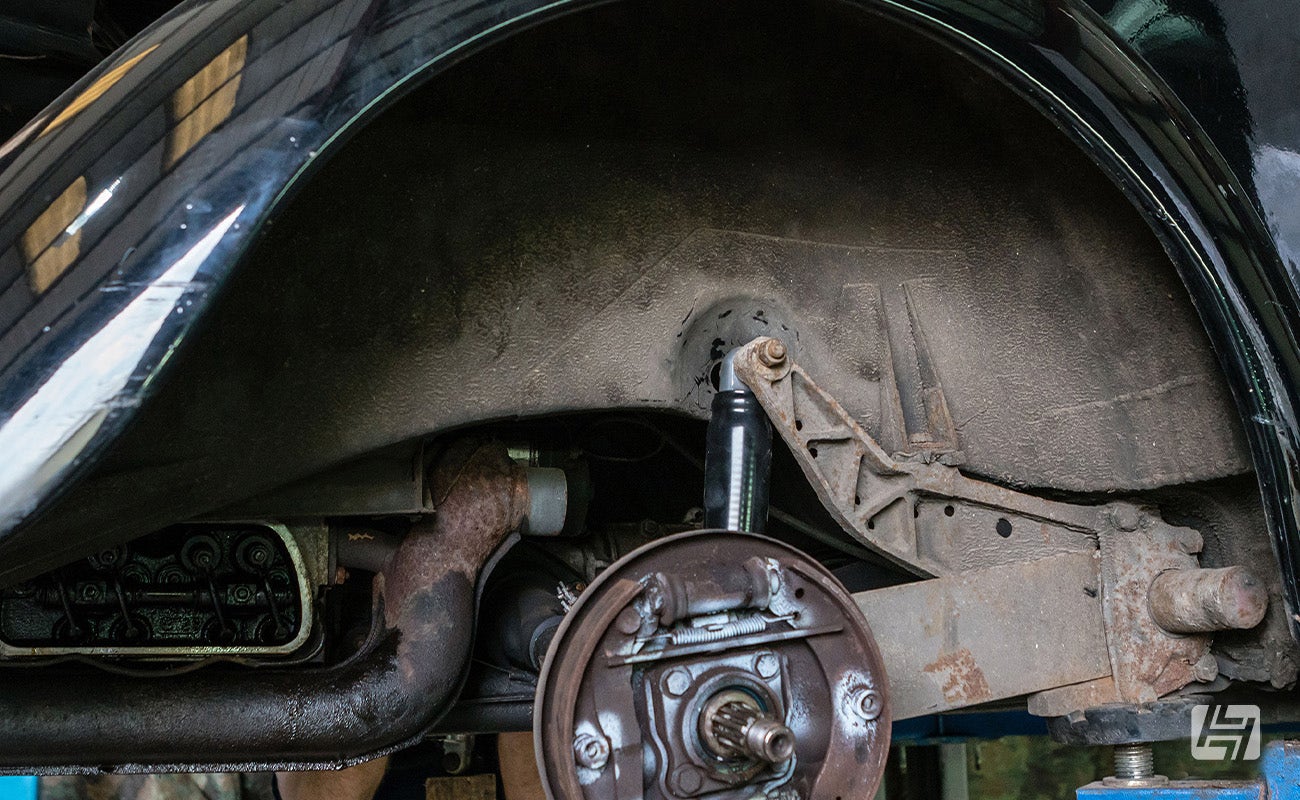 Close up of VW Beetle rear suspension and drum brakes