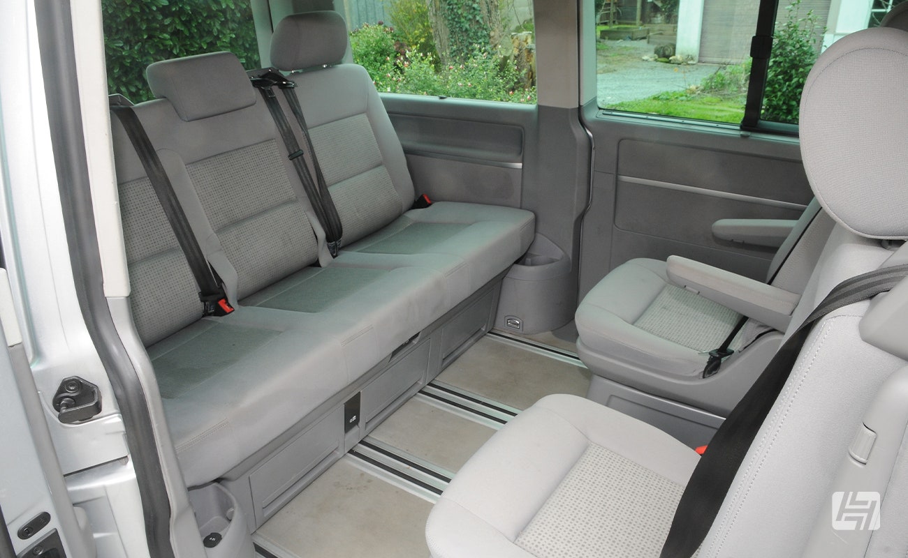 VW T5 Caravelle rear interior with captain seats and pull down bed