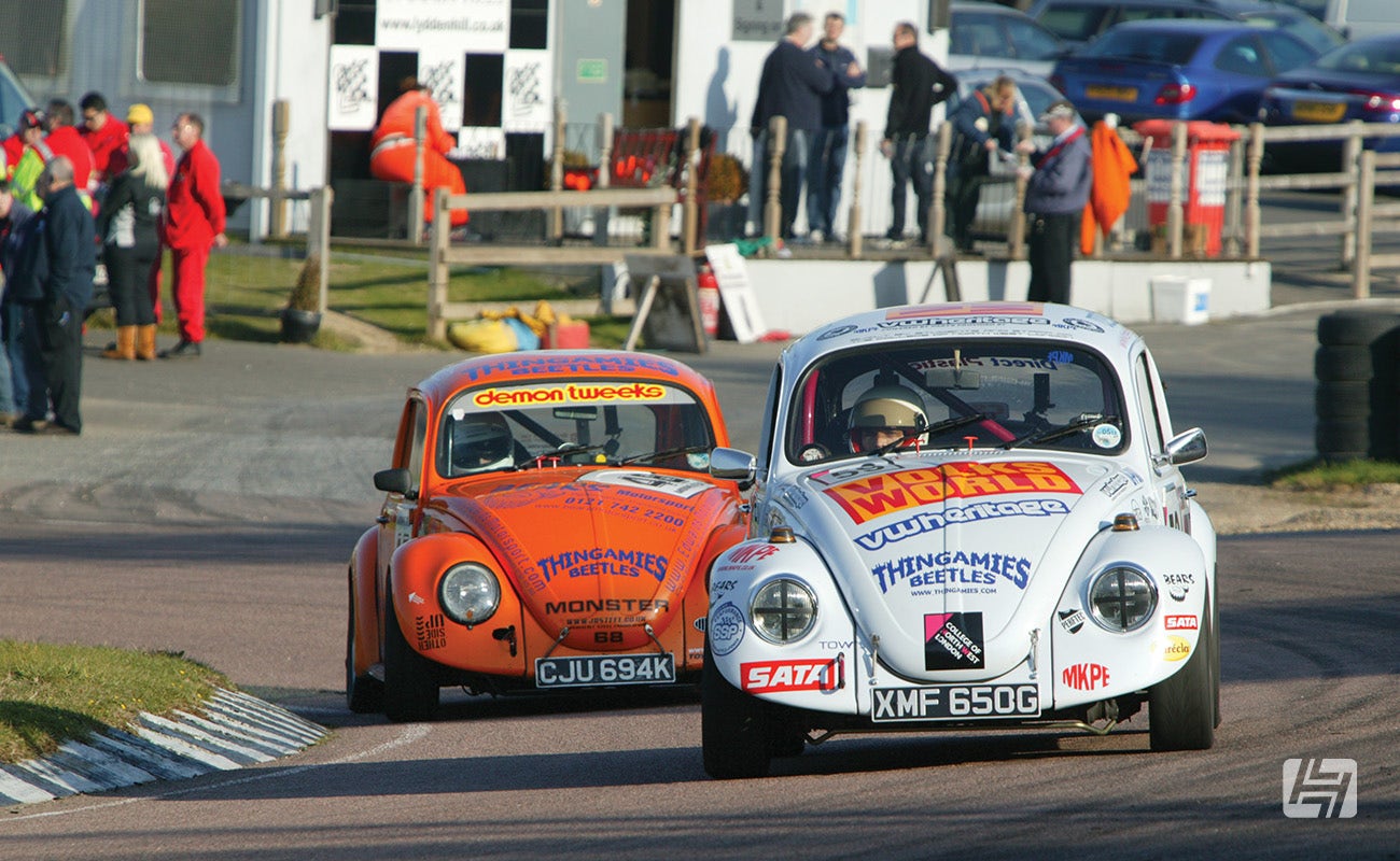VW Beetles racing on race circuit