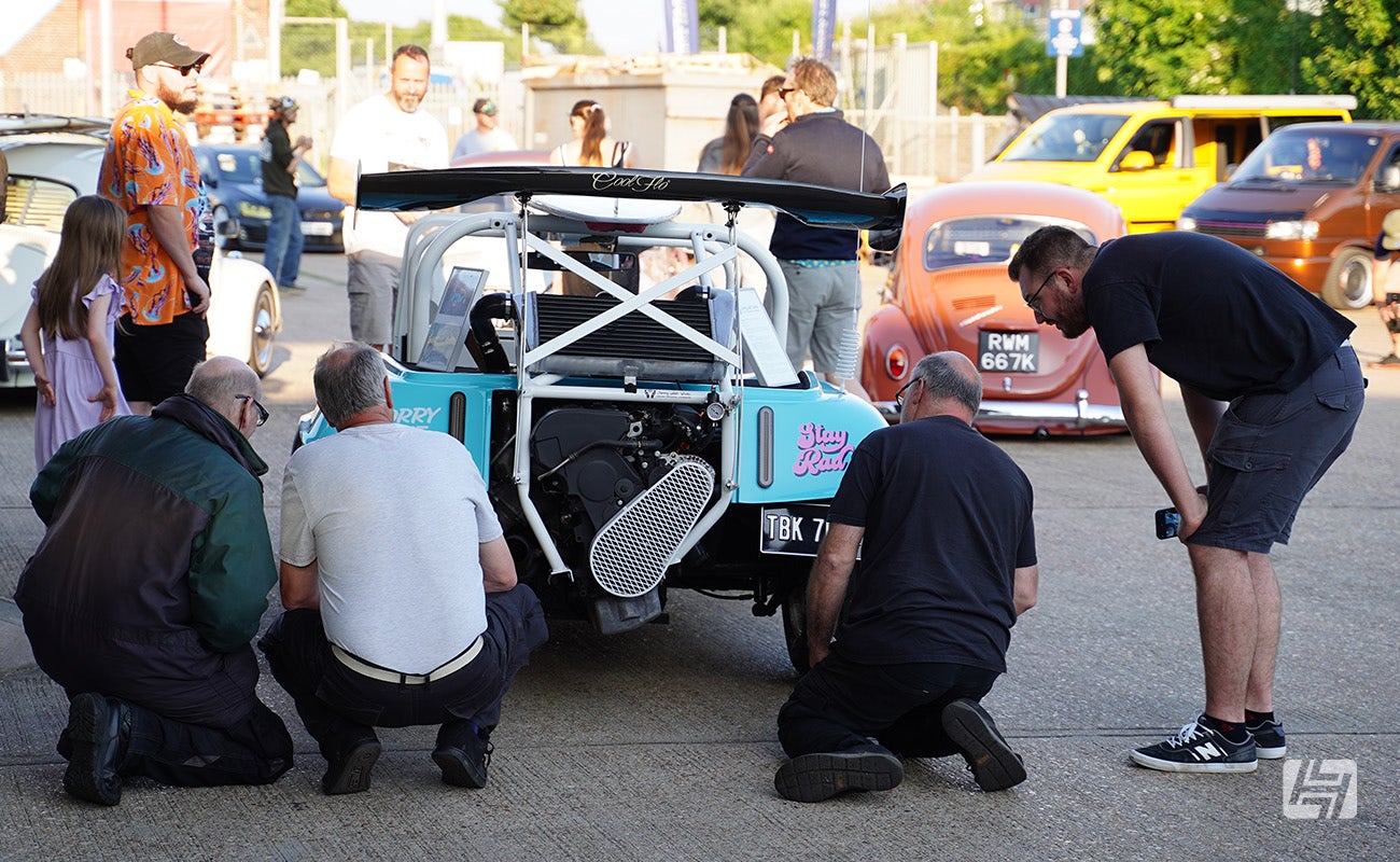 Enthusiasts checking out the Boosted Buggy at Heretics at Heritage Parts Centre in June 2024