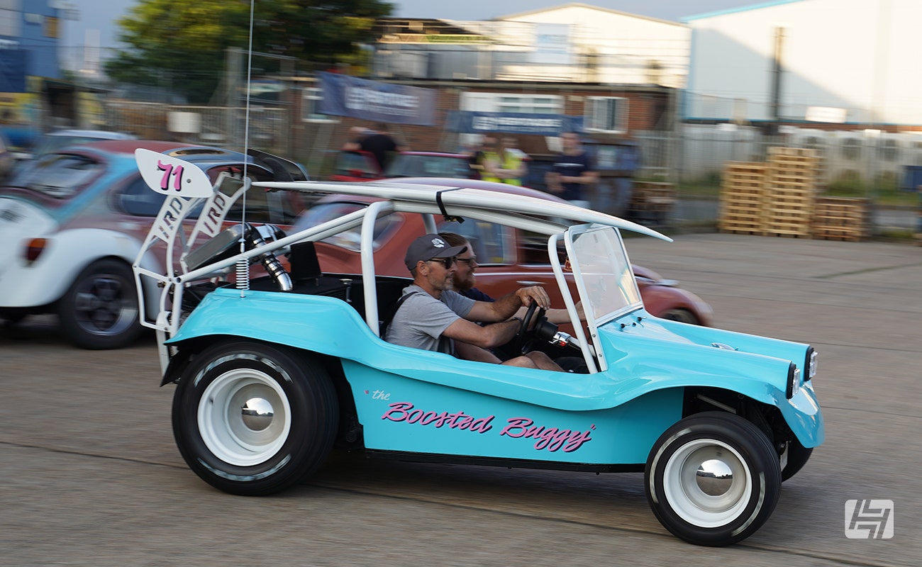Kaz takes Chris for a quick spin in the Boosted Buggy at Heretics at Heritage Parts Centre in June 2024