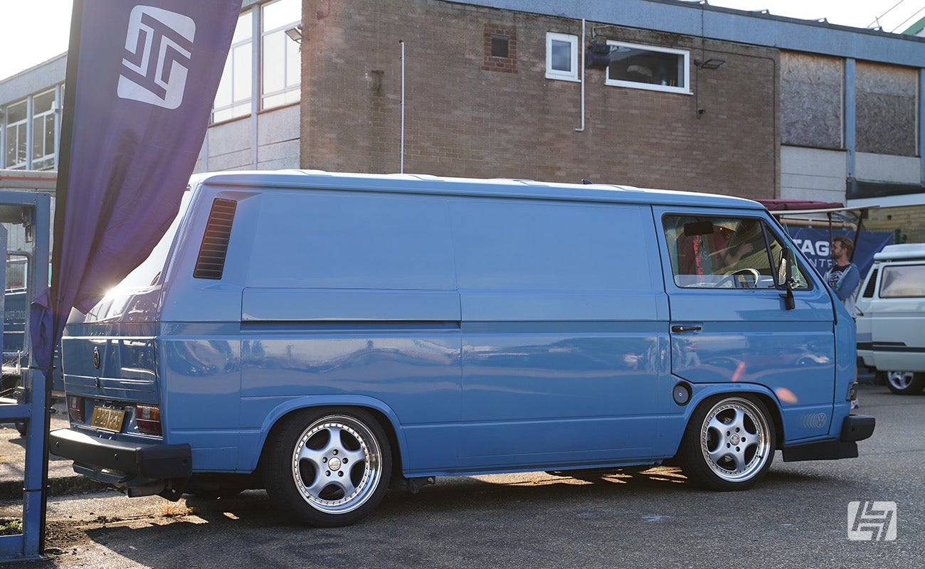 Slammed blue VW T3 Panelvan at Heretics at Heritage Parts Centre in June 2024