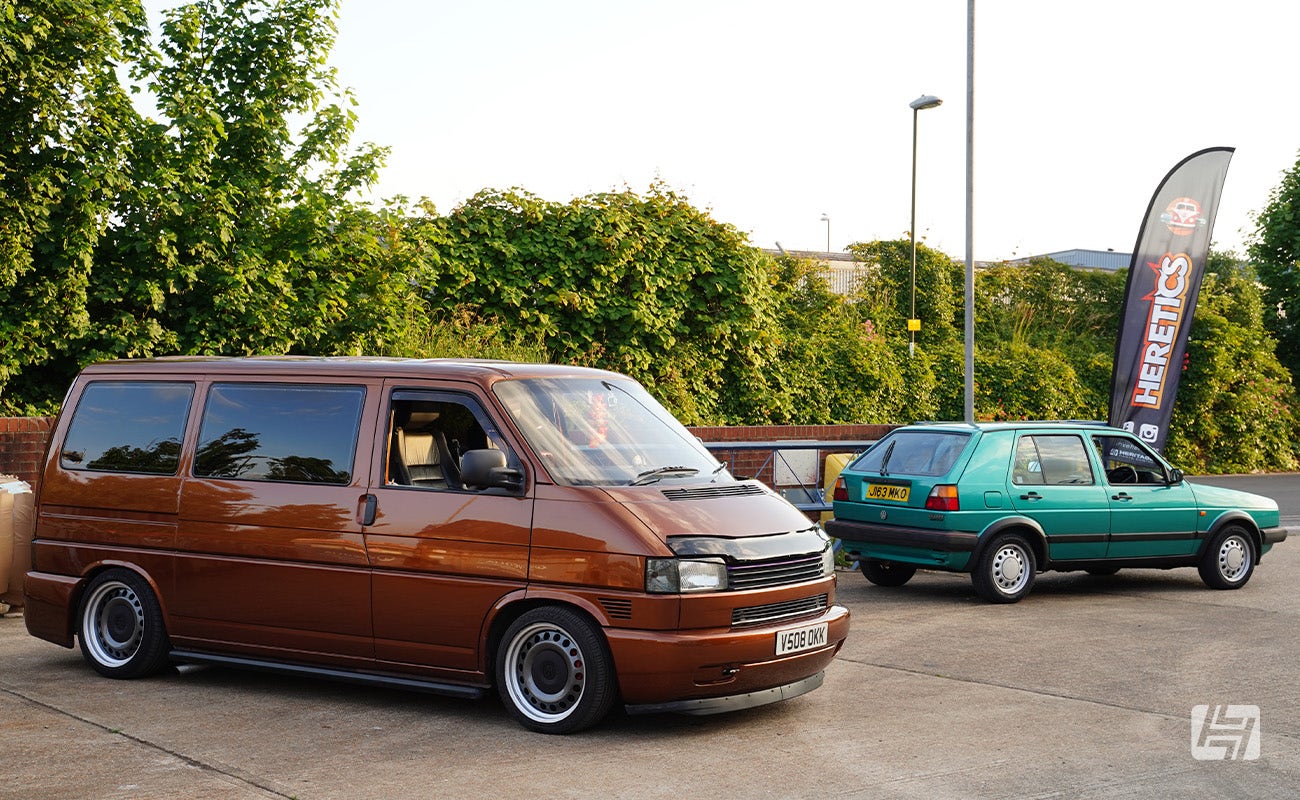 Brown VW T4 and Montana Green VW Golf Mk2 at Heretics at Heritage Parts Centre in June 2024