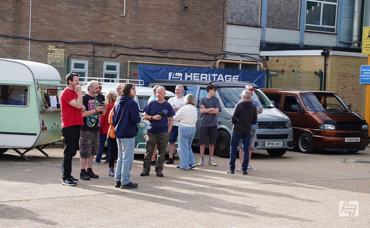Enthusiasts chatting at Heretics VW and Porsche enthusiast meeting at Heritage Parts Centre