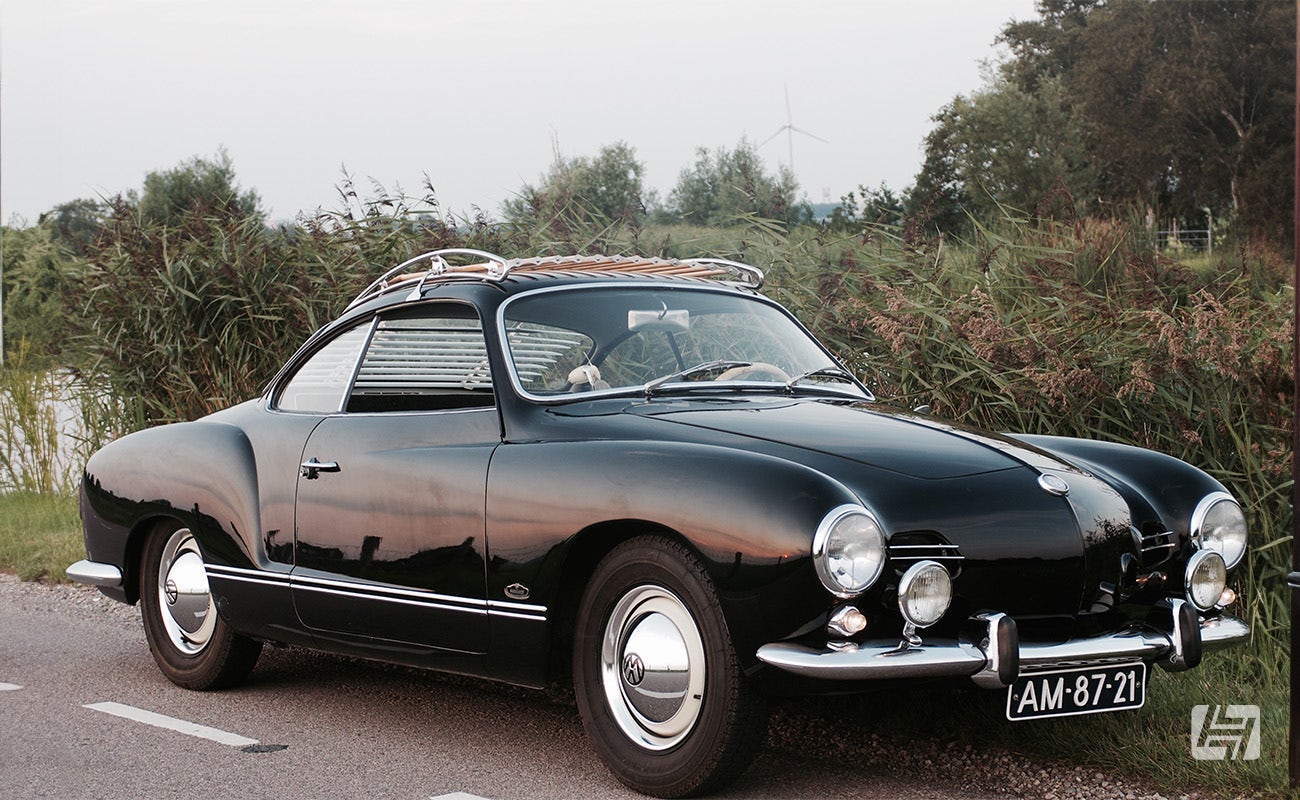 Black Lowlight Karmann Ghia Coupe with Vintage Speed roofrack fitted