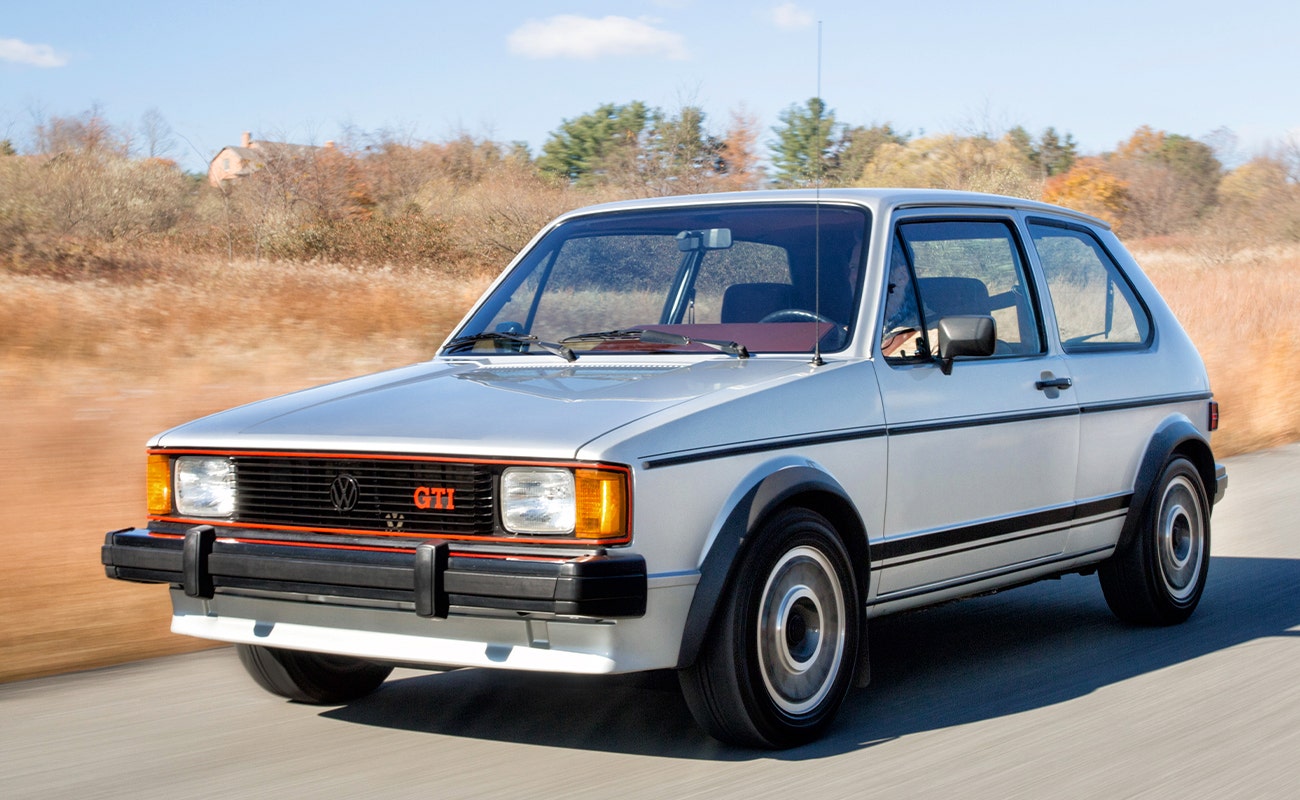 Silver VW Rabbit GTI driving