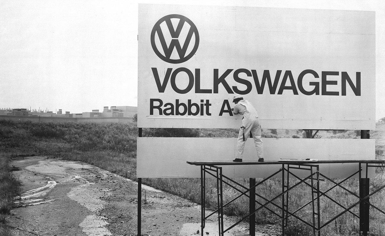 Workman Taking down the VW Westmoreland Factory Sign
