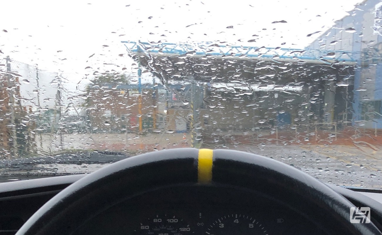 Rain falling on car windscreen
