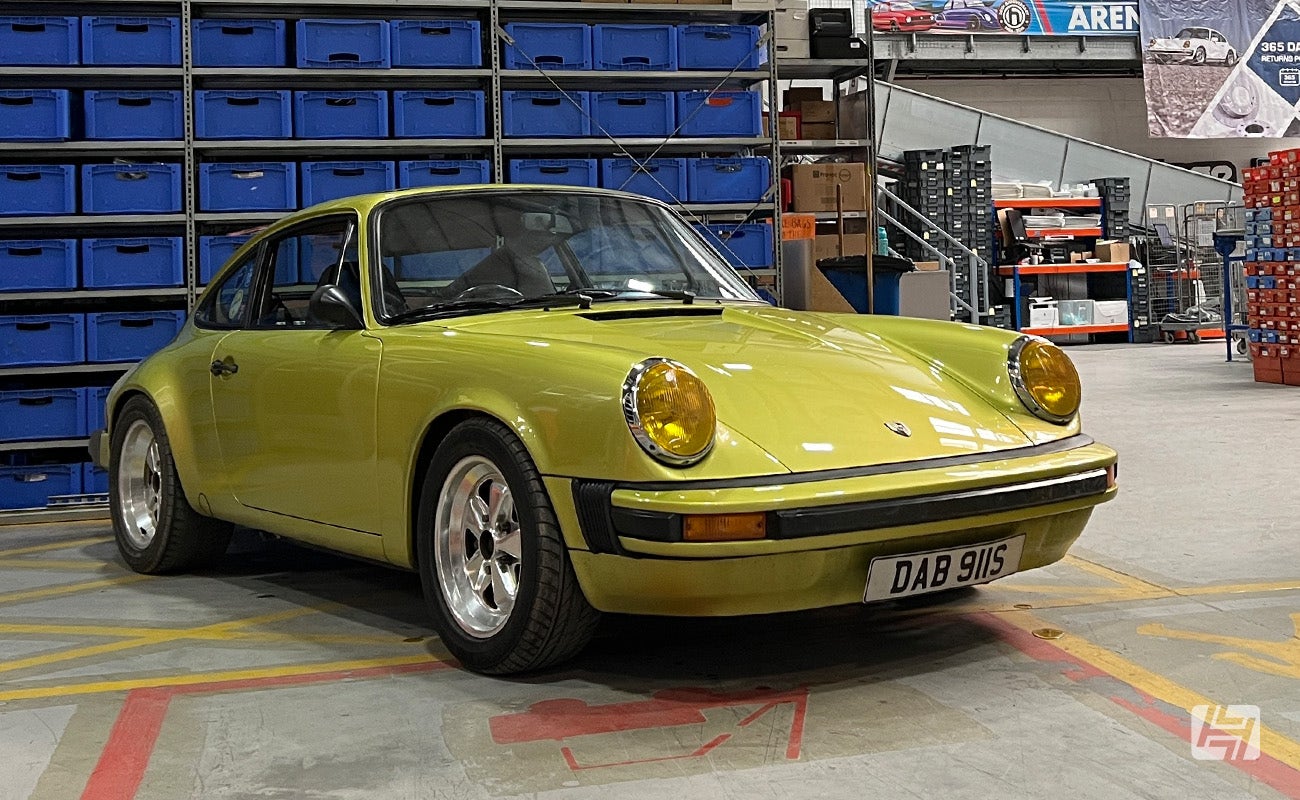 Green Porsche 911 SC at Heritage Parts Centre 9Werks warehouse meet