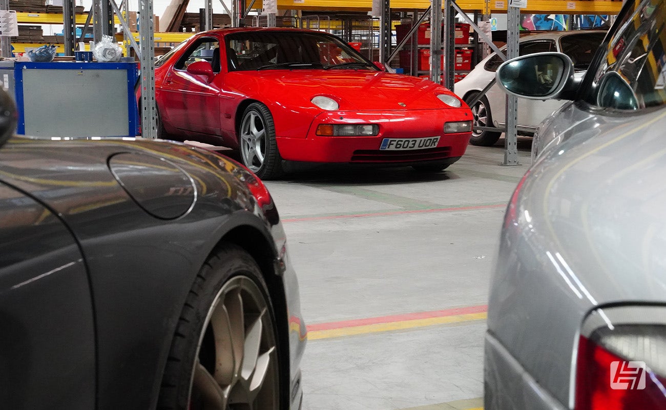 Red Porsche 928 at Heritage Parts Centre 9Werks warehouse meet