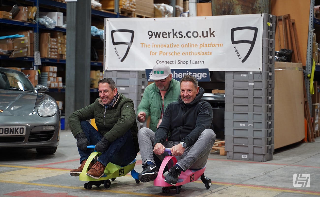 Andy Brooks from 9Werks gives the Wiggle car racers a push start at Heritage Parts Centre 9Werks warehouse meet