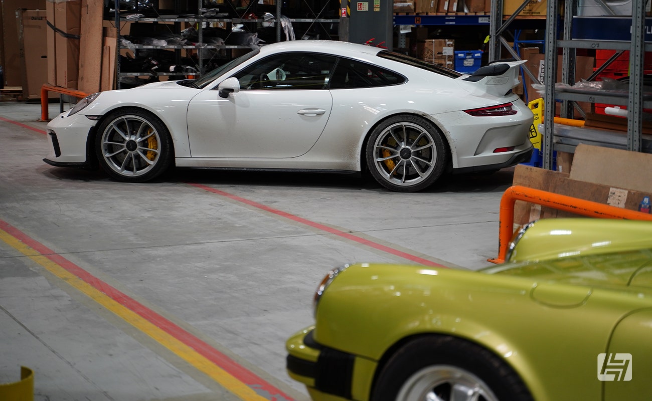 White Porsche 991.2 GT3 at Heritage Parts Centre 9Werks warehouse meet