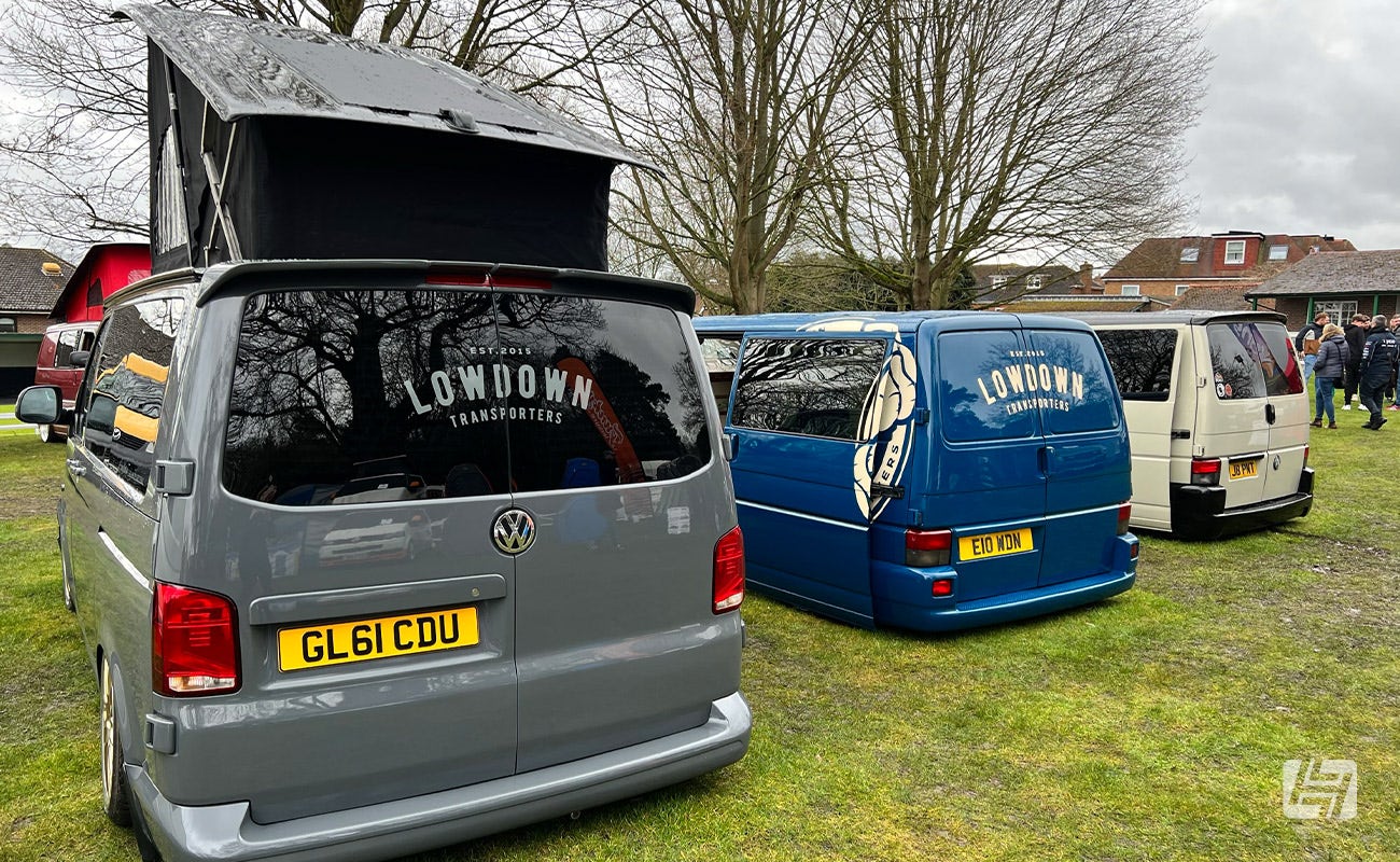 Modern VW Transporters parked on the lawn at Volksworld show
