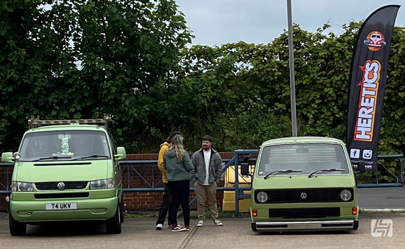Body dropped T25 next to VW T4 at Heretics enthusiasts meet at Heritage Parts Centre May 2025