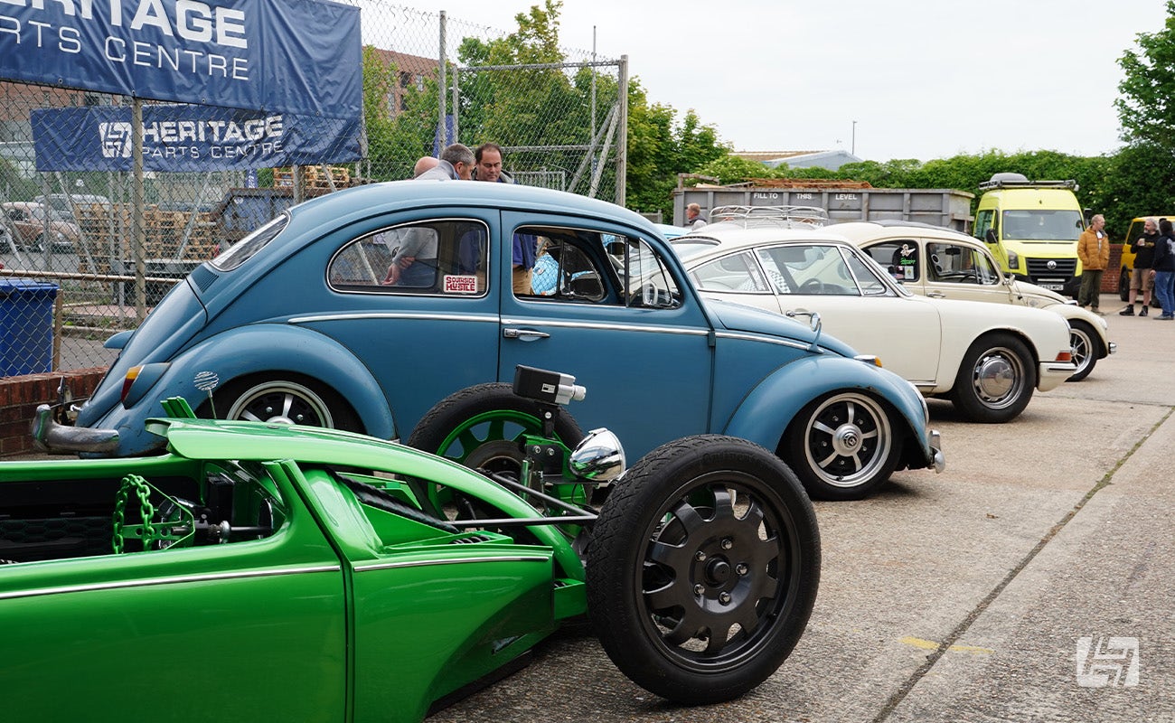 VW Beetles and Porsches at Heretics enthusiasts meet at Heritage Parts Centre May 2025