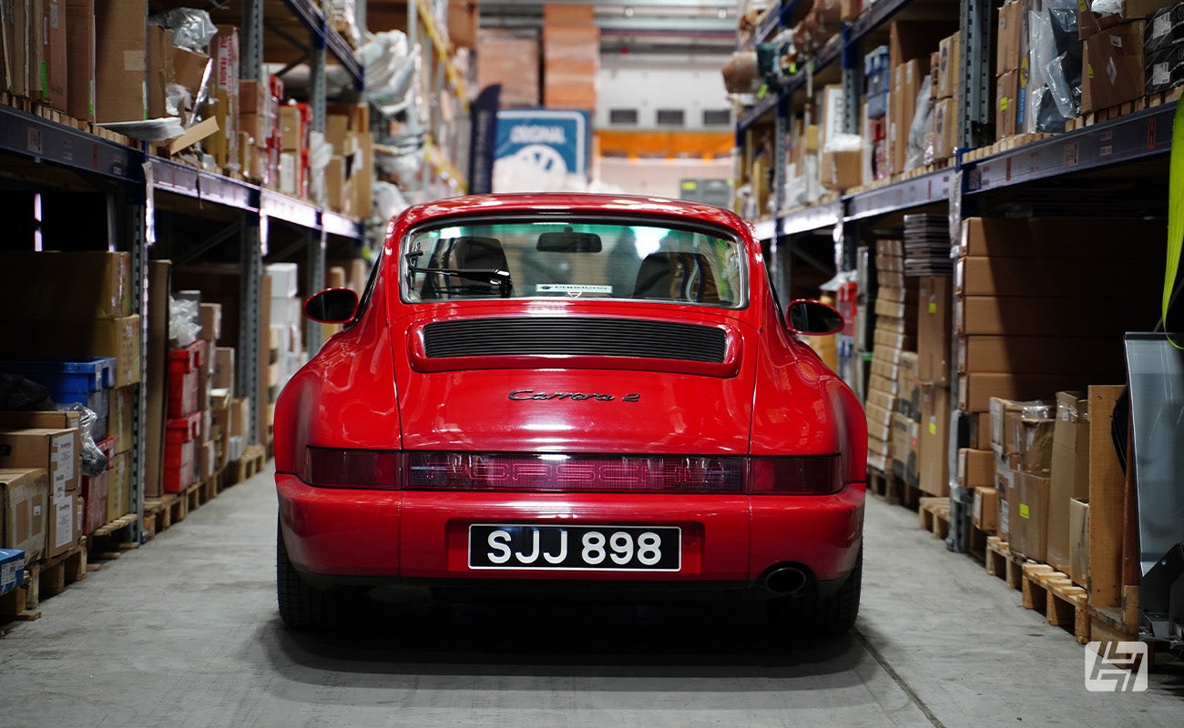 Guards Red Porsche 964 rear at Heritage Parts Centre 9Werks warehouse meet
